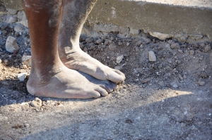 The mortar mixer's feet. How many of us would be willing to work barefoot?